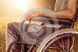 Closeup of Man on Wheelchair Enjoying Nature photo