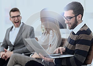 Closeup.man working on laptop