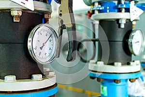 Closeup of manometer in a boiler room