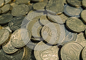 Closeup of many different euro coins on a stack