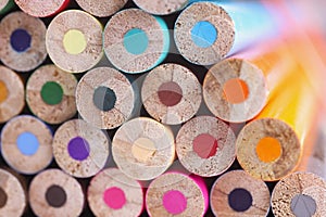 Closeup of many multicolored blunt pencils background
