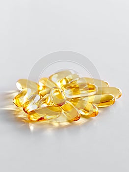 Closeup of many omega 3 oil capsules