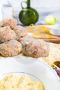 Closeup meat balls ground beef rolled breadcrumbs