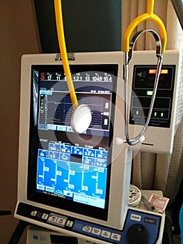 Closeup of a mechanical ventilator with stethoscope