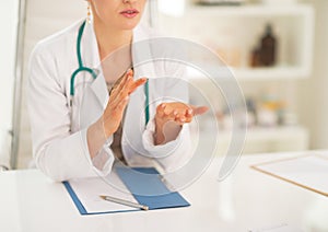 Closeup on medical doctor explaining something photo