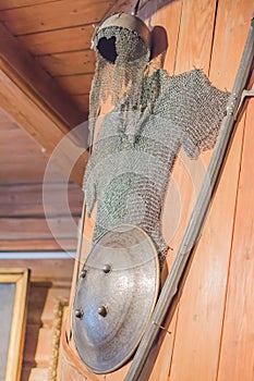 Closeup of Medieval armors hanging on wooden wall