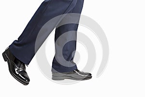 Closeup of Men's Stylish Semi-Brogue Oxford Shoes on a Walking M