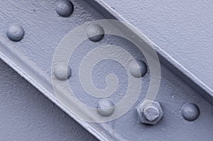 Closeup of a metal construction, bolted and painted gray, Germany