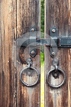 Closeup of a metal latch on a wooden gate Olde-worlde photo