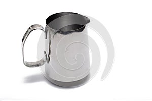 Closeup metal milk jug handle white background