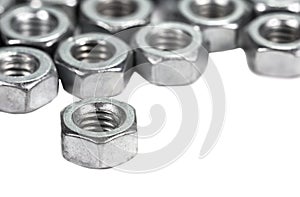 Closeup metal (bolt) and nuts on white background.