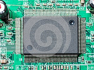 Closeup of microchip on PCB board