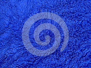 Closeup microfiber cloth. Abstract blue background texture.