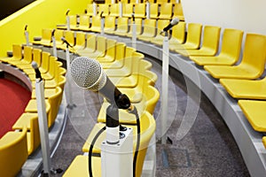Closeup microphone on holder in conference photo