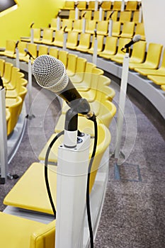 Closeup microphone on holder in conference photo