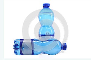 Closeup of mineral water bottles isolated on a white background