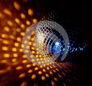 Closeup of a mirrorball on a white photo