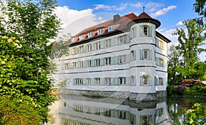 Closeup of the Moated Castle surrounded with trees in the City of Bad Rappenau in Germany