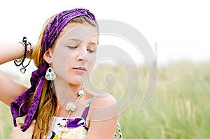 Closeup of model girl on the beach