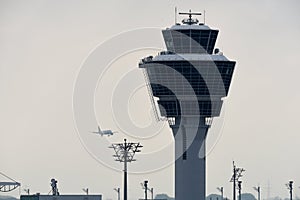 Closeup modern aircraft tower aircraft approaching airport