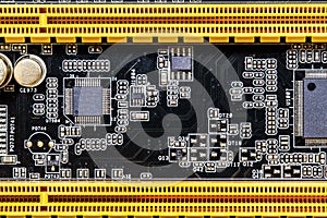 A Closeup of Modern Computer Motherboard Circuitry and Capacitors photo