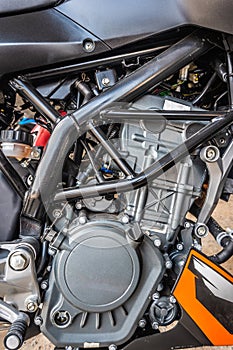 Closeup modern motorcycle engine detail system black