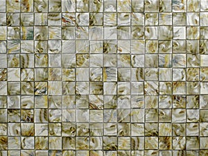 Closeup of mosaic tile wall background.