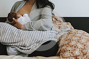 Closeup Mother breastfeeding her baby