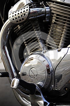 Closeup of a motorcycle engine with chrome plating