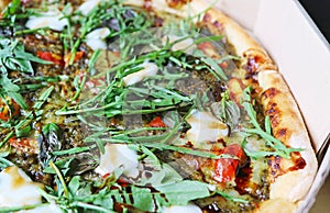 Mouthwatering Margherita Pizza Topped with Arugula and Balsamic photo