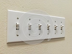 Multiple Light Switches Grouped Together photo