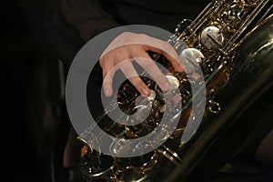 Closeup of Musician Playing Baritone Saxophone