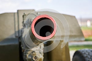 A closeup of the muzzle of a cannon
