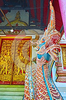 Closeup of the Naga serpent of Wat Puak Taem, Chiang Mai, Thailand photo