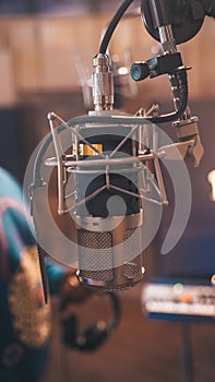 Closeup of a Nashville Tennessee Studio Mic with a blurred brown background