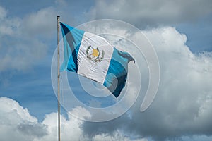 Closeup of national flag waving in wind, La Antigua, Guatemala photo