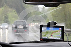 Closeup of a navigation device in a car