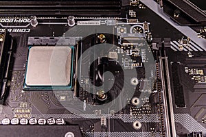 Closeup of the new modern computer motherboard with installed cpu