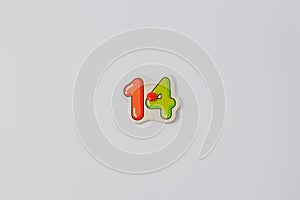 Closeup of a number 14 isolated on a white background