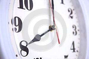 Closeup odern wall clock white, time and period, office timepiece and mockup with hour and minute