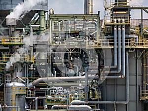 Closeup oil refinery plant while steaming.