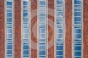Closeup of old brick Wall of an industrial or historical building with old window