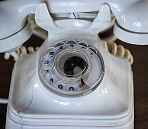 closeup of an old dial phone