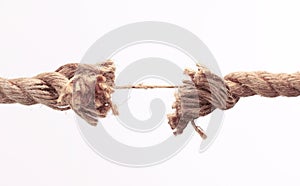 Closeup.old frayed rope .isolated on a white background.