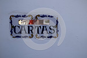 Closeup of an old mailbox with the word