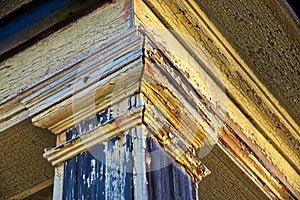 Closeup of old painted house pillar