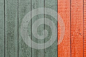 Closeup of old red and green wood planks texture background