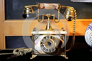 Closeup of an old retro telephone, rotary dial phone