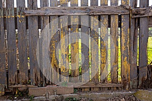 Closeup of old rotten wooden garden fence