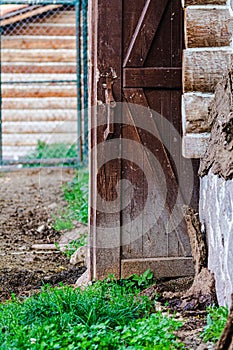 Closeup of an old rustic door of a farm house